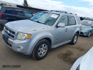 2009 Ford Escape Hybrid with VIN 1FMCU49319KA88009, listed as a IAAI auction lot 42065410 with 239,319 mi miles. Bid and sale history available at carsss.com. Image 2.