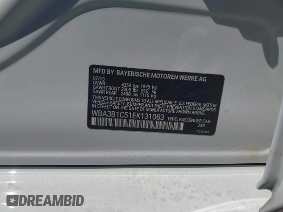 2014 BMW 3 Series 320i with VIN WBA3B1C51EK131063, listed as a IAAI auction lot 42043086 with 92,306 mi miles. Bid and sale history available at carsss.com. Image 9.