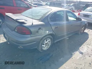 2004 Pontiac Grand Am SE1 z VIN 1G2NF52F04M513755, wystawiony jako IAAI lot #41600613 z przebiegiem Nie podano mil oraz . Historia ofert i sprzedaży dostępna na DreamBid. Obrazek 4.
