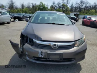 2012 Honda Civic LX z VIN 19XFB2F59CE309285, wystawiony jako Copart lot #57823965 z przebiegiem 95 991 mil mil oraz Szkoda całkowita • Salvage title. Historia ofert i sprzedaży dostępna na DreamBid. Obrazek 5.