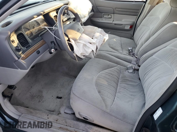 1996 Ford Crown Victoria LX z VIN 2FALP74W0TX205507, wystawiony jako Copart lot #85310874 z przebiegiem 51 646 mil mil oraz Szkoda całkowita • Salvage title. Historia ofert i sprzedaży dostępna na DreamBid. Obrazek 7.
