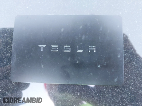 2023 Tesla Model Y Performance with VIN 7SAYGDEF2PF800641, listed as a IAAI auction lot 41612596 with 60,984 mi miles and . Bid and sale history available at DreamBid. Image 11.