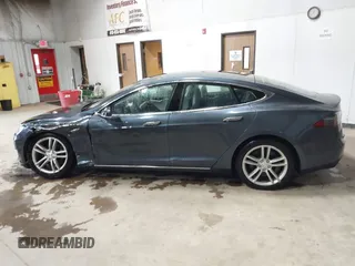 2014 Tesla Model S 60 with VIN 5YJSA1H16EFP52853, listed as a IAAI auction lot 41941989 with 132,038 mi miles and . Bid and sale history available at DreamBid. Image 14.