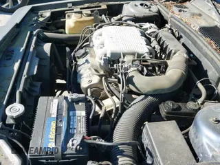 1990 Dodge Dynasty with VIN 1B3XC4639LD800339, listed as a IAAI auction lot 42624306 with 66,804 mi miles and . Bid and sale history available at DreamBid. Image 13.