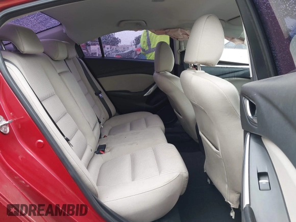 2016 Mazda 6 i Sport with VIN JM1GJ1U54G1457194, listed as a IAAI auction lot 41725704 with 109,628 mi miles and . Bid and sale history available at DreamBid. Image 8.