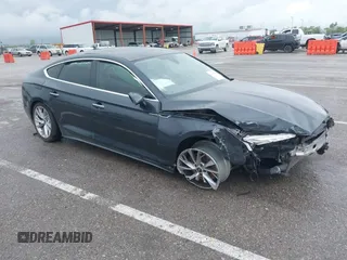 2022 Audi A5 Sportback Premium Plus z VIN WAUCBCF57NA009059, wystawiony jako IAAI lot #42059183 z przebiegiem 87 474 mil mil oraz . Historia ofert i sprzedaży dostępna na DreamBid. Obrazek 1.