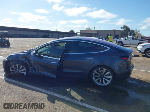 2018 Tesla Model 3 Long Range Battery with VIN 5YJ3E1EA4JF006036, listed as a IAAI auction lot 41934680 with 115,649 mi miles and . Bid and sale history available at DreamBid. Image 13.