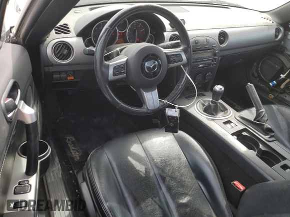 2008 Mazda MX-5 Miata Touring with VIN JM1NC26F780146072, listed as a Copart auction lot 65602695 with 124,607 mi miles and Salvage title. Bid and sale history available at DreamBid. Image 8.