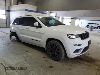 2018 Jeep Grand Cherokee Overland with VIN 1C4RJFCG5JC211145, listed as a Copart auction lot 54138865 with 115,679 mi miles and Salvage title. Bid and sale history available at DreamBid. Image 4.