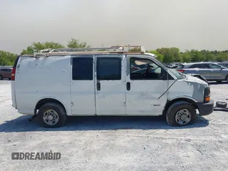 2005 Chevrolet Express Cargo Van with VIN 1GCGG25VX51226784, listed as a IAAI auction lot 42012325 with 537,878 mi miles. Bid and sale history available at carsss.com. Image 13.