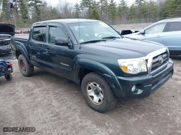 2009 Toyota Tacoma with VIN 3TMLU42N09M031972, listed as a IAAI auction lot 42001100 with 163,567 mi miles. Bid and sale history available at carsss.com. Image 1.