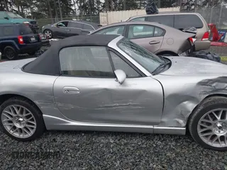 2002 Mazda MX-5 Miata Cloth z VIN JM1NB353620221304, wystawiony jako IAAI lot #41178747 z przebiegiem 98 958 mil mil oraz . Historia ofert i sprzedaży dostępna na DreamBid. Obrazek 13.
