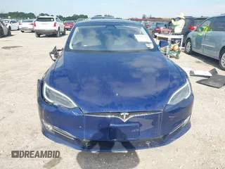 2017 Tesla Model S 100D with VIN 5YJSA1E28HF217489, listed as a IAAI auction lot 42128388 with Not provided miles and . Bid and sale history available at DreamBid. Image 13.