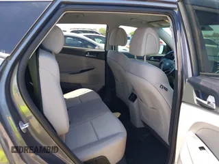 2017 Hyundai Tucson Value with VIN KM8J33A29HU312752, listed as a IAAI auction lot 42575164 with 76,297 mi miles and . Bid and sale history available at DreamBid. Image 8.
