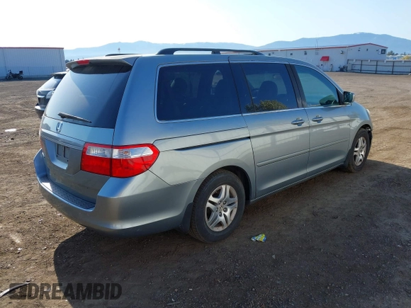 2007 Honda Odyssey EX-L with VIN 5FNRL38707B044142, listed as a IAAI auction lot 42094414 with 173,963 mi miles. Bid and sale history available at carsss.com. Image 4.