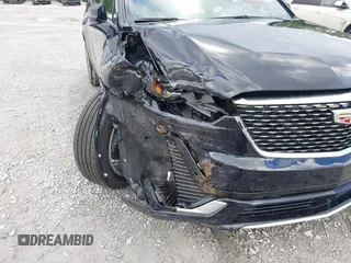 2022 Cadillac XT6 Premium Luxury with VIN 1GYKPCRS4NZ145145, listed as a IAAI auction lot 42533642 with 36,450 mi miles and . Bid and sale history available at DreamBid. Image 6.