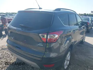 2017 Ford Escape SE with VIN 1FMCU0GD7HUA38402, listed as a IAAI auction lot 41964197 with 205,577 mi miles. Bid and sale history available at carsss.com. Image 4.