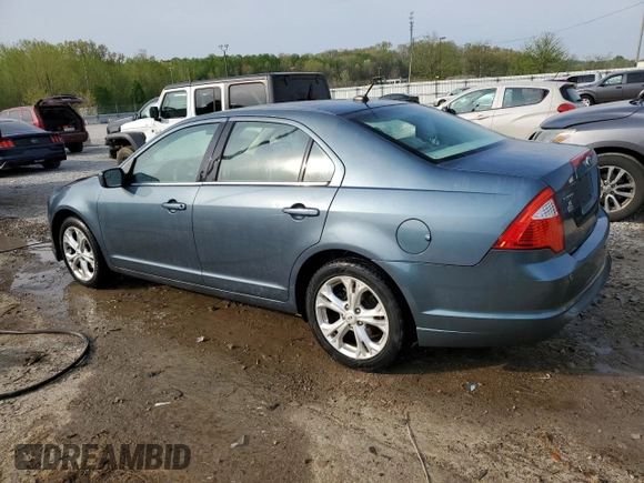 2012 Ford Fusion SE with VIN 3FAHP0HAXCR312560, listed as a Copart auction lot 53553765 with 184,302 mi miles and Non repairable. Bid and sale history available at DreamBid. Image 2.