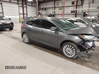 2012 Ford Focus Titanium with VIN 1FAHP3N27CL313288, listed as a IAAI auction lot 41741895 with 140,376 mi miles and . Bid and sale history available at carsss.com. Image 1.