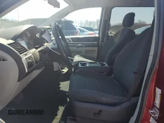 2010 Dodge Grand Caravan SXT with VIN 2D4RN5D1XAR389037, listed as a Copart auction lot 53931905 with 169,794 mi miles and Salvage Title. Bid and sale history available at DreamBid. Image 7.
