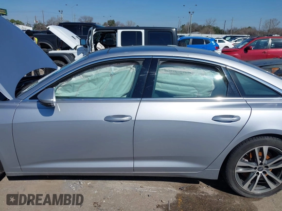 2023 Audi A6 Premium with VIN WAUD3BF26PN023919, listed as a IAAI auction lot 41615718 with 34,938 mi miles and . Bid and sale history available at DreamBid. Image 14.