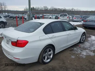 2013 BMW 3 Series 328i with VIN WBA3C1G57DNR49126, listed as a IAAI auction lot 41334342 with 164,710 mi miles and . Bid and sale history available at DreamBid. Image 4.
