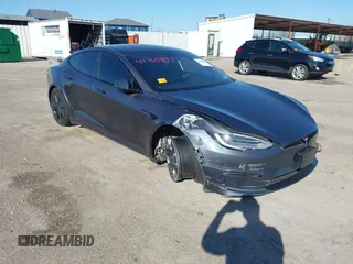 2022 Tesla Model S with VIN 5YJSA1E57NF467229, listed as a IAAI auction lot 41765897 with Not Provided miles and . Bid and sale history available at DreamBid. Image 1.