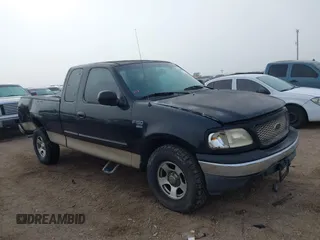 2000 Ford F-150 XL with VIN 1FTRX17L4YKB03771, listed as a IAAI auction lot 41668491 with 1 mi miles. Bid and sale history available at carsss.com. Image 13.