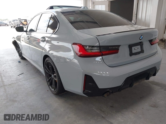 2023 BMW 3 Series 330i with VIN 3MW69FF01P8D33427, listed as a IAAI auction lot 42461734 with 15,587 mi miles and . Bid and sale history available at DreamBid. Image 3.