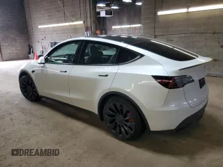 2023 Tesla Model Y Performance z VIN 7SAYGDEF6PF798103, wystawiony jako Copart lot #53607895 z przebiegiem 22 334 mil mil oraz Szkoda całkowita • Salvage title. Historia ofert i sprzedaży dostępna na DreamBid. Obrazek 2.