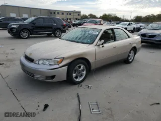 1997 Lexus ES 300 Luxury Sport Sdn with VIN JT8BF22GXV0046390, listed as a Copart auction lot 82545064 with 113,442 mi miles and Salvage Title. Bid and sale history available at carsss.com. Image 1.