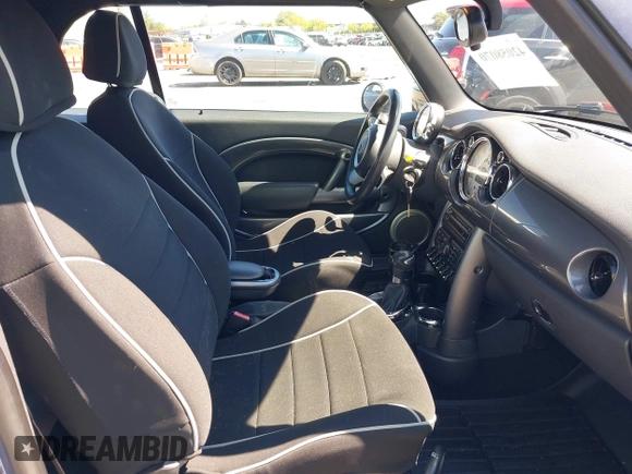 2005 MINI Convertible S with VIN WMWRH335X5TK55816, listed as a IAAI auction lot 42058070 with 105,208 mi miles and . Bid and sale history available at DreamBid. Image 5.