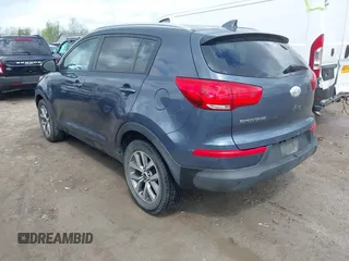 2014 Kia Sportage LX with VIN KNDPB3AC2E7647405, listed as a IAAI auction lot 42151049 with 102,724 mi miles and . Bid and sale history available at carsss.com. Image 3.