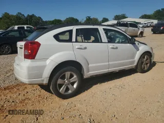 2011 Dodge Caliber Mainstreet z VIN 1B3CB3HA7BD116153, wystawiony jako Copart lot #53153945 z przebiegiem Nie podano mil oraz Szkody całkowita. Historia ofert i sprzedaży dostępna na DreamBid. Obrazek 3.