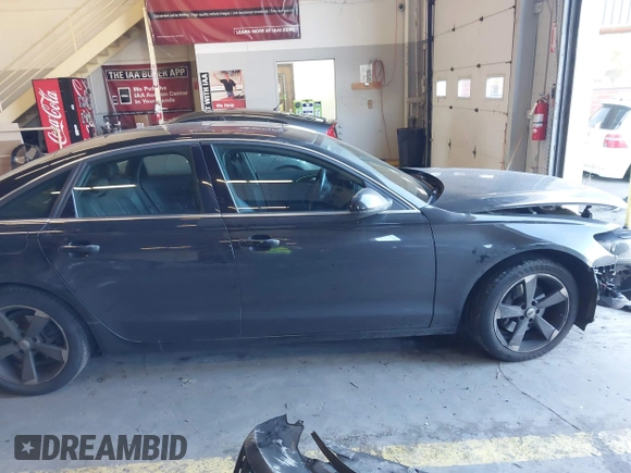 2013 Audi A6 Premium Plus z VIN WAUGFAFC6DN083752, wystawiony jako IAAI lot #41550154 z przebiegiem 151 910 mil mil oraz . Historia ofert i sprzedaży dostępna na DreamBid. Obrazek 14.
