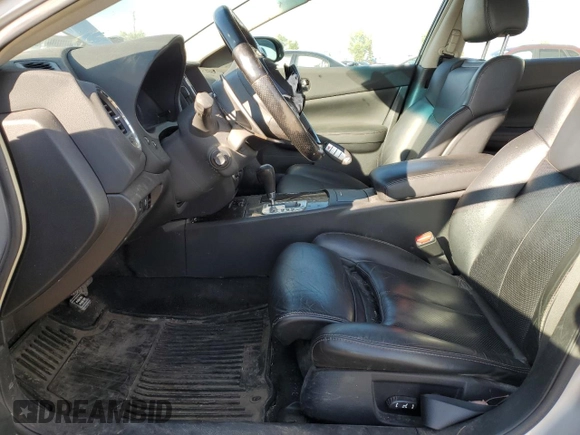2010 Nissan Maxima SV with VIN 1N4AA5AP7AC871283, listed as a Copart auction lot 66394785 with 295,925 mi miles and Salvage title. Bid and sale history available at DreamBid. Image 7.