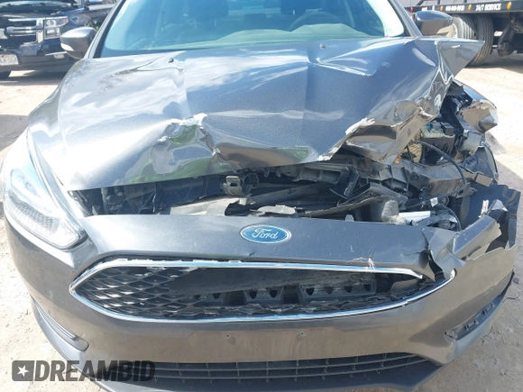 2018 Ford Focus SE with VIN 1FADP3F26JL249433, listed as a IAAI auction lot 41871395 with 131,357 mi miles. Bid and sale history available at carsss.com. Image 6.