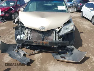 2012 Toyota Sienna XLE AAS with VIN 5TDYK3DC0CS202891, listed as a IAAI auction lot 41938594 with Not Provided miles and . Bid and sale history available at carsss.com. Image 6.