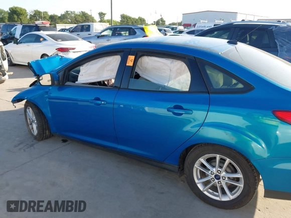 2016 Ford Focus SE with VIN 1FADP3F2XGL387131, listed as a IAAI auction lot 41992802 with 112,274 mi miles and . Bid and sale history available at DreamBid. Image 14.