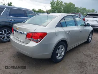 2014 Chevrolet Cruze 1LT with VIN 1G1PC5SB5E7174588, listed as a IAAI auction lot 42638357 with 89,813 mi miles and . Bid and sale history available at DreamBid. Image 4.