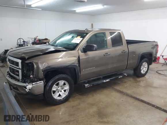 2014 Chevrolet Silverado 1500 LT with VIN 1GCVKREC5EZ147506, listed as a IAAI auction lot 41736960 with 112,399 mi miles and . Bid and sale history available at DreamBid. Image 2.