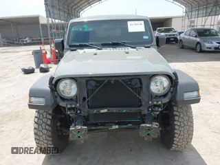 2022 Jeep Wrangler Sport S z VIN 1C4GJXAG8NW232480, wystawiony jako IAAI lot #42248150 z przebiegiem 23 918 mil mil oraz . Historia ofert i sprzedaży dostępna na DreamBid. Obrazek 13.