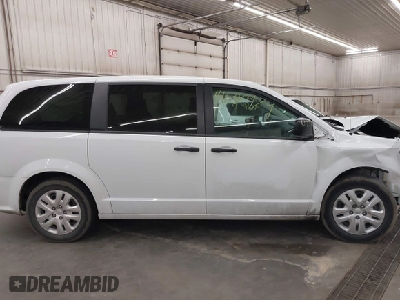 2020 Dodge Grand Caravan SE with VIN 2C4RDGBG4LR168233, listed as a IAAI auction lot 41680974 with 62,765 mi miles and . Bid and sale history available at DreamBid. Image 14.