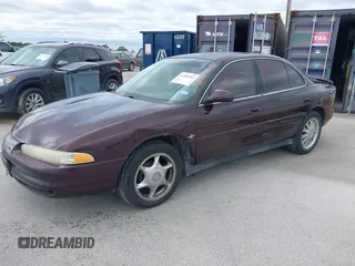 2002 Oldsmobile Intrigue GL z VIN 1G3WS52H52F283810, wystawiony jako IAAI lot #41585482 z przebiegiem 118 623 mil mil oraz . Historia ofert i sprzedaży dostępna na DreamBid. Obrazek 2.