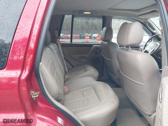 2004 Jeep Grand Cherokee Limited with VIN 1J4GW58S94C299311, listed as a IAAI auction lot 41912467 with 55,736 mi miles. Bid and sale history available at carsss.com. Image 8.