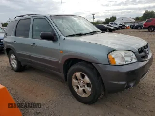 2003 Mazda Tribute LX with VIN 4F2YZ94123KM49852, listed as a Copart auction lot 71779054 with 263,938 mi miles and Salvage Title. Bid and sale history available at carsss.com. Image 4.