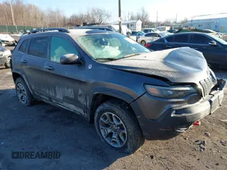 2021 Jeep Cherokee Trailhawk z VIN 1C4PJMBX3MD217814, wystawiony jako IAAI lot #41392588 z przebiegiem 37 823 mil mil oraz . Historia ofert i sprzedaży dostępna na DreamBid. Obrazek 1.