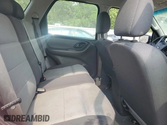 2007 Ford Escape XLS with VIN 1FMYU92ZX7KB69167, listed as a Copart auction lot 59600185 with 162,442 mi miles and Salvage title. Bid and sale history available at DreamBid. Image 11.