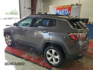 2018 Jeep Compass Altitude with VIN 3C4NJDBB9JT457242, listed as a Copart auction lot 60886385 with 143,467 mi miles and Salvage title. Bid and sale history available at DreamBid. Image 2.