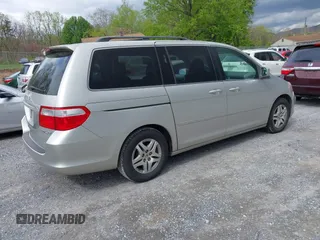 2005 Honda Odyssey EX-L with VIN 5FNRL38795B083325, listed as a IAAI auction lot 42034632 with 183,865 mi miles. Bid and sale history available at carsss.com. Image 4.